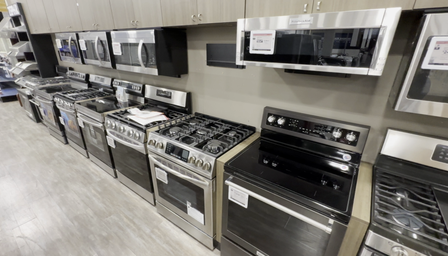 One of 64 unposed input views in an appliance showroom