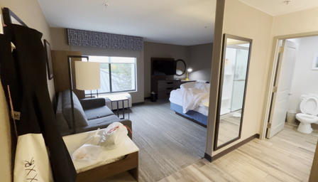 One of 64 unposed input views of a hotel room